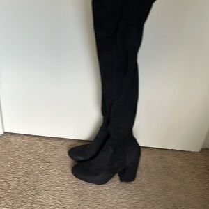 Over the knee black boots